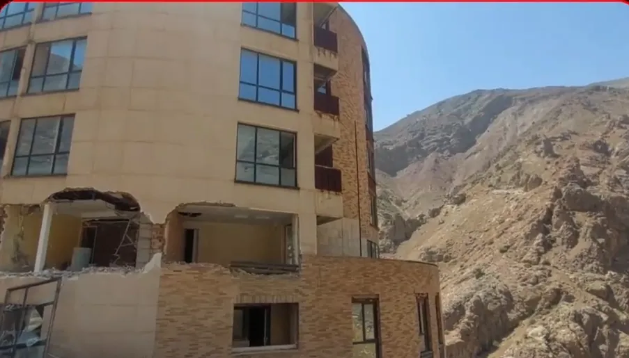 تخریب ساختمان 10 طبقه غیرمجاز در میگون آغاز شد